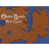 Outer Banks, North Carolina Stained Wood and Dark Walnut Frame Lake Map Silhouette